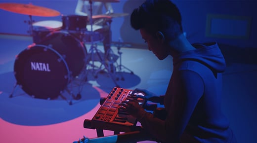A computer generated scene with a person playing a keyboard. In the background another person sits at a drum set with the words 'NATAL' printed on a big drum positioned on its side.