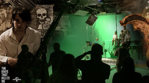 Silhouettes of people in the foreground looking towards a green screen studio with TV cameras and lights. To the left of the image, a still of a person from The Knife That Killed Me film sat against a graffiti covered wall.